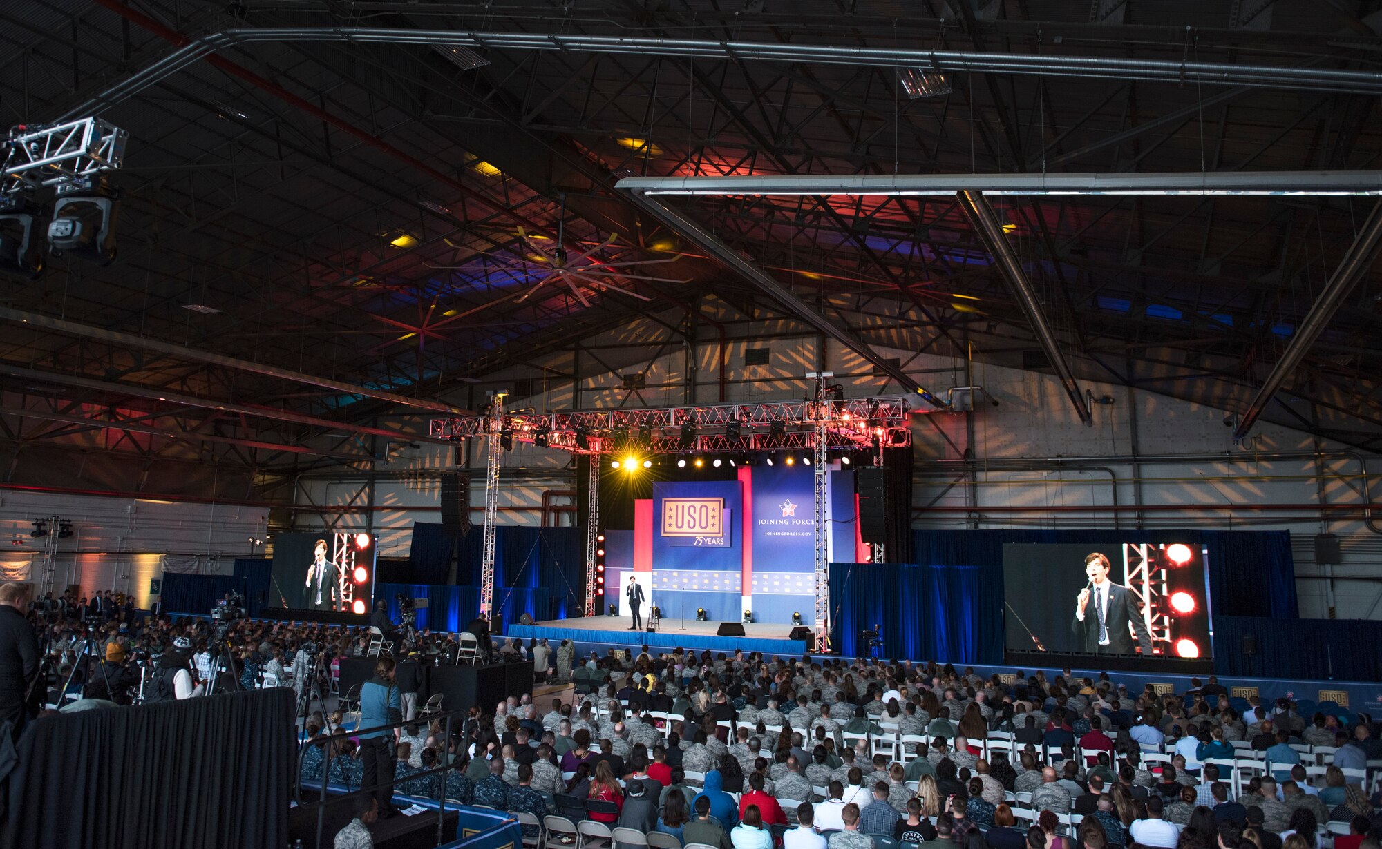 Audience members watch the ‘Celebration of Service’ comedy show on Joint Base Andrews, Md., May 5, 2016. The show celebrated Military Appreciation Month, the 5th Anniversary of Joining Forces and the 75th Anniversary of the USO. Nearly 1,500 service members, veterans and their families were on hand to see performances by Judd Apatow, Mike Birbiglia, Kristen Schaal, Hasan Minhaj, John Mulaney and Jeff Ross. (U.S. Air Force photo by Airman 1st Class Philip Bryant)