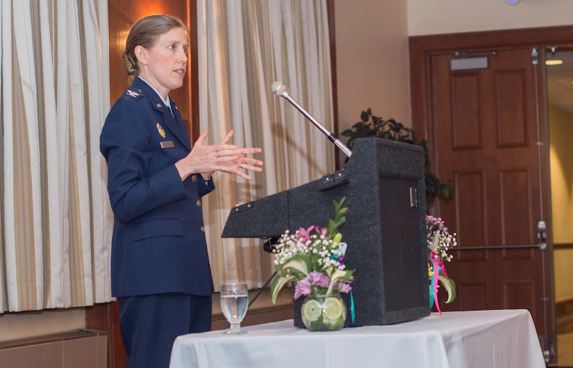 Col. Julie Grundahl, 11th Wing vice commander, speaks to Military Spouse Appreciation Day luncheon attendees at The Club on Joint Base Andrews, Md., May 6, 2016. Grundahl explained the importance of determining priorities regarding family life and what trials and tribulations she has faced as a spouse. (U.S. Air Force photo by Senior Airman Ryan J. Sonnier/RELEASED)