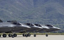 Four F-35 Lightning II aircraft prepare for takeoff at Hill Air Force Base, Utah, May 4. Hill's active duty and Reserve F-35 pilots recently began flying routine four-ship configurations, just as they would in combat. This marks a key milestone in getting the Air Force's newest fighter jet to reach Initial Operational Capability later this year, at which time it will be combat-ready. (U.S. Air Force photo by Paul Holcomb)