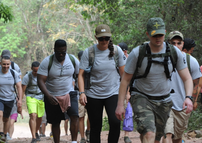 Some of the 158 members of Joint Task Force-Bravo, Soto Cano Air Base, Honduras, who participated in Chapel Hike 67 ascend the 3.7-mile road to Montaña La Oki, a small village located in the mountains east of Comayagua, Honduras, April 30, 2016 to deliver 3,000 pounds of food to 172 families in need. Chapel hikes have been occurring since 2003, with the JTF-Bravo Chapel sponsoring an average of six every year. The hikes are designed to provide a practical way for JTF-Bravo members to engage and partner with local communities to provide support to surrounding villages in need of food and supplies. (U.S. Air Force photo by Capt. David Liapis/Released)