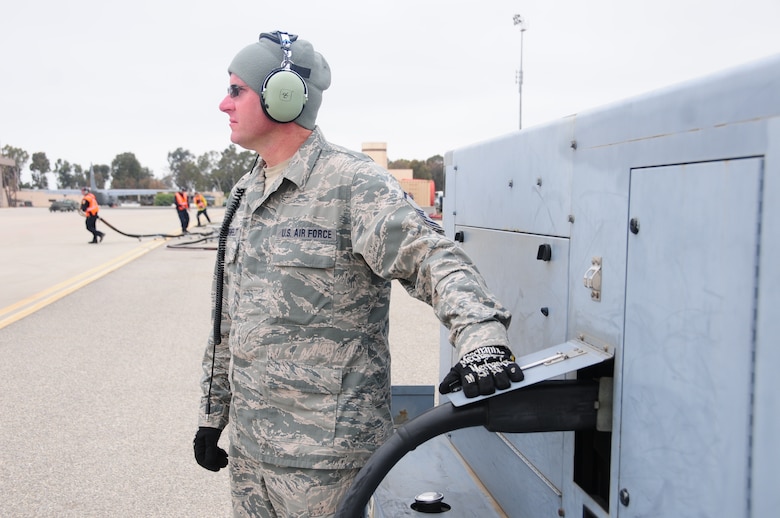 U.S. Air National Guard Master Sgt. Dennis Heidenfelft from the 145th Airlift Wing in Charlotte, N.C. refuels a C-130 during firefighting training at the 146th Airlift Wing in Port Hueneme, California on May 4, 2016. Air National Guard and Reserve units from across the U.S. convened for MAFFS (Modular Airborne Fire Fighting Systems)annual certification and training this week to prepare for the upcoming fire season in support of U.S. Forest Service. (U.S. Air National Guard photo by Senior Airman Madeleine Richards/Released)
