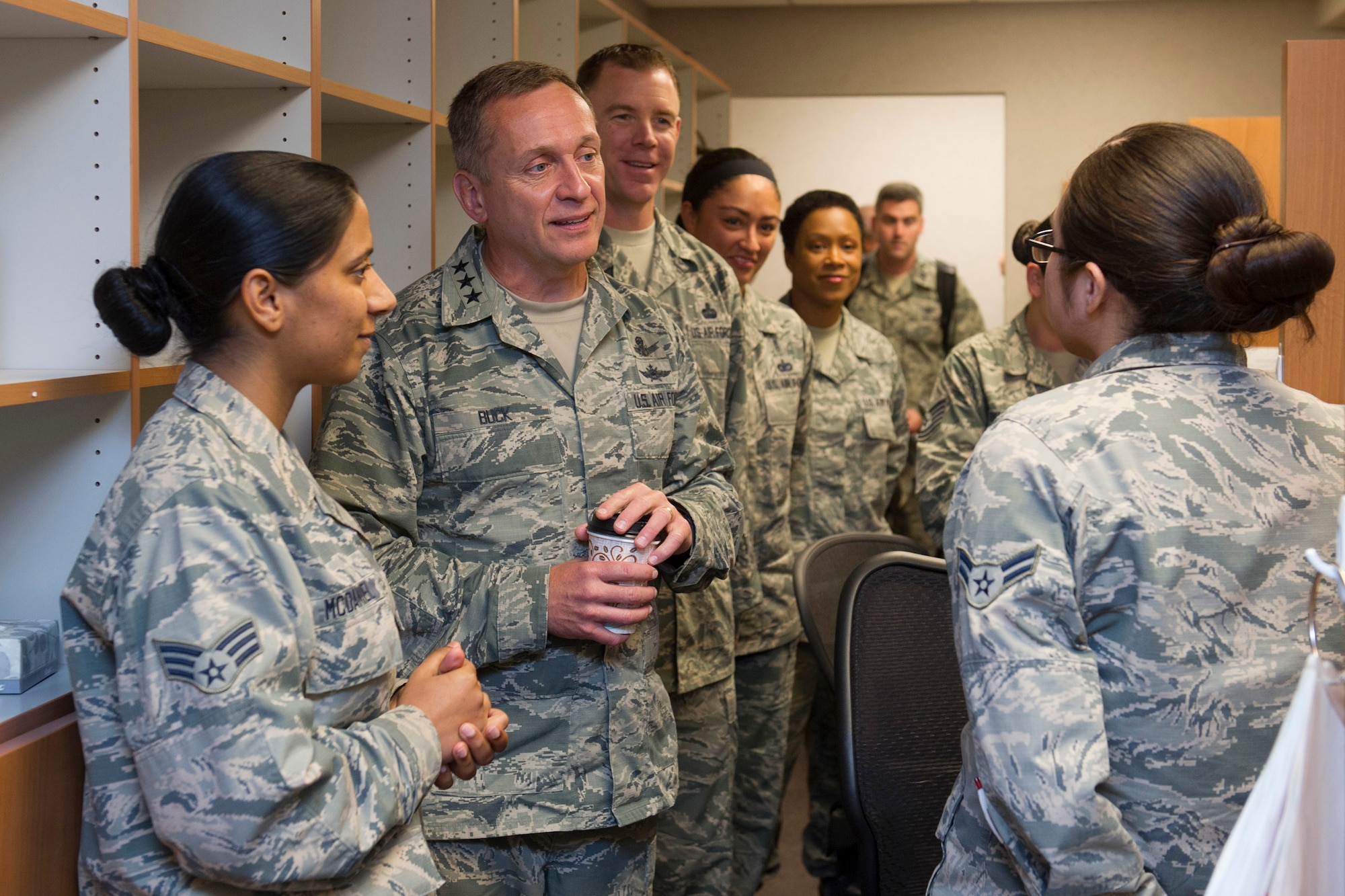 Lt. Gen. David J. Buck, commander, 14th Air Force (Air Forces Strategic), Air Force Space Command; and commander, Joint Functional Component Command for Space, U.S. Strategic Command, and Chief Master Sgt. Craig Neri, 14th AF command chief and command senior enlisted leader for JFCC Space, talk with Airmen working at the Satellite Pharmacy on Patrick Air Force Base, Florida, May 4, 2016. Buck and Neri visited Patrick Air Force Base and Cape Canaveral Air Force Station May 4 and 5 and gained insight into the contributions Airmen across the wing make to keep the 45th Space Wing the World's Premier Gateway to Space. (U.S. Air Force photo by Matthew Jurgens/Released)