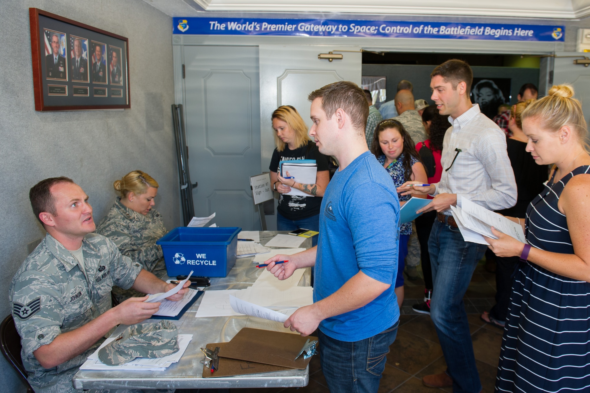 Individual Ready Reserve Muster attendees gather in the base theater to process through required stations here at Patrick Air Force Base, Fla., May 6, 2016. The stations the attendees process through include medical, Air Force Reserve recruiting, Veteran's Assistance benefits, and military identification. (U.S. Air Force photo/Benjamin Thacker) (Released)