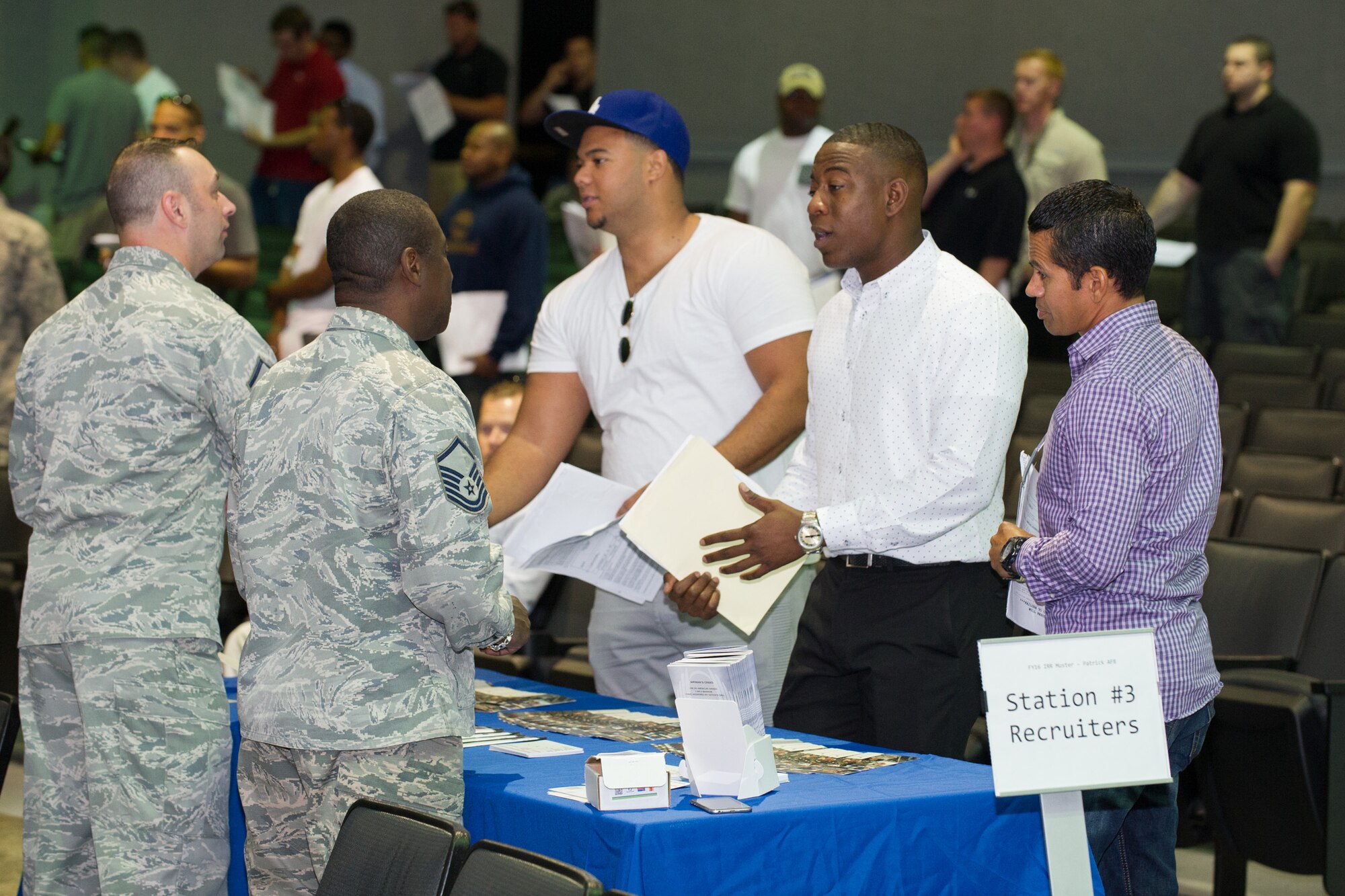 Individual Ready Reserve Muster attendees gather in the base theater to process through required stations here at Patrick Air Force Base, Fla., May 6, 2016. The stations the attendees process through include medical, Air Force Reserve recruiting, Veteran's Assistance benefits, and military identification. (U.S. Air Force photo/Benjamin Thacker) (Released)