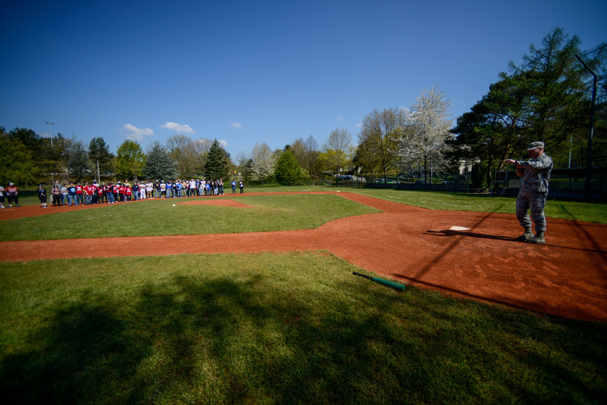 Brig. Gen. Jon T. Thomas, 86th Airlift Wing commander gives opening comments during an adaptive-sports softball game May 2, 2016, at Ramstein Air Base, Germany.  Students from Kaiserslautern and Ramstein middle and high schools paired up with volunteers from the local Guzzlers soft-ball team to participate in the event. (U.S. Air Force photo/Senior Airman Nicole Keim)