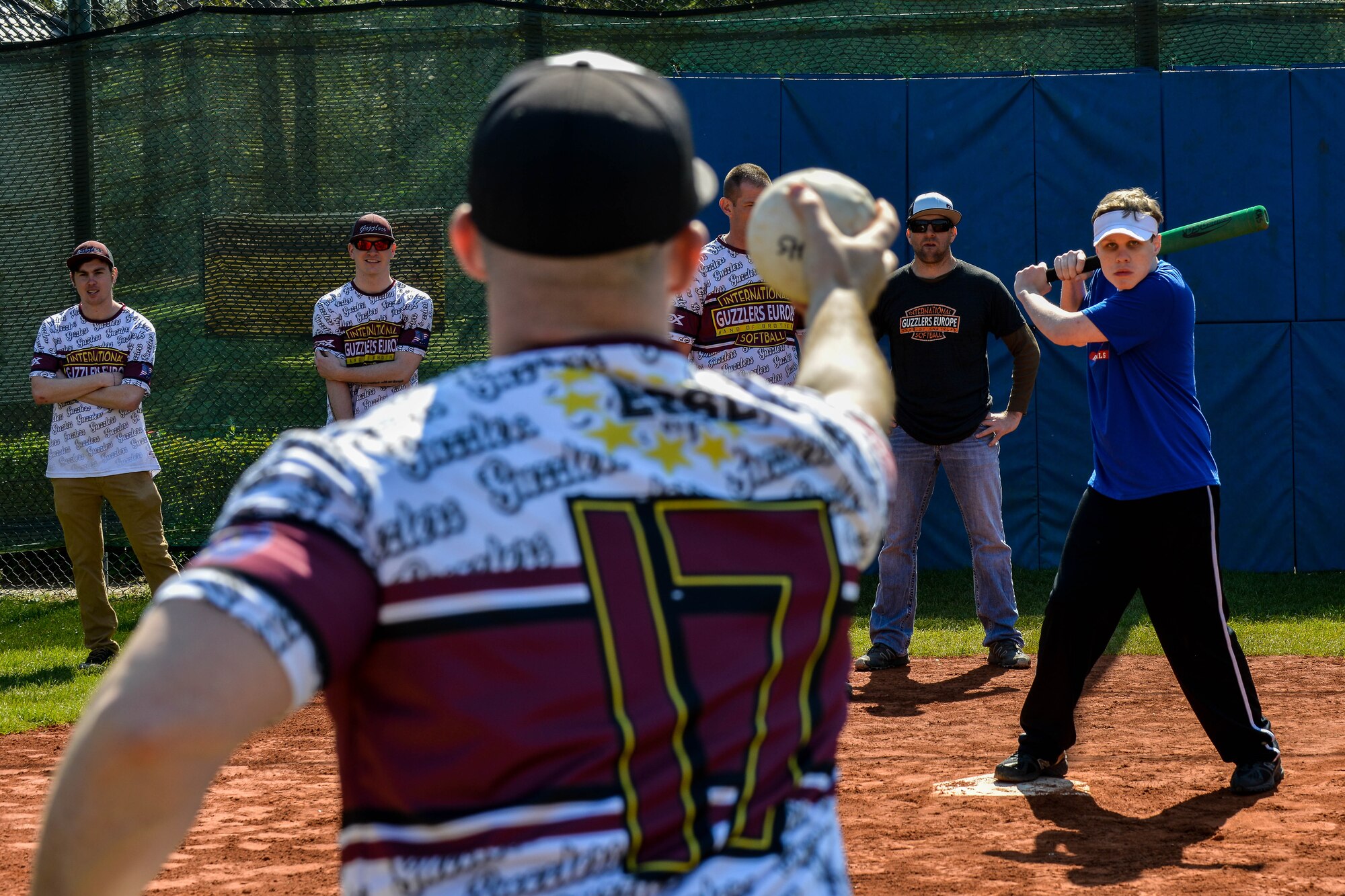 Tech. Sgt. Clifford Howey, 86th Security Forces Squadron assistant flight chief, pitches a ball during an adaptive-sports softball game May 2, 2016, at Ramstein Air Base, Germany.  More than 20 Ramstein and Kaiserslautern middle and high school students participated in the event. (U.S. Air Force photo/Senior Airman Nicole Keim)