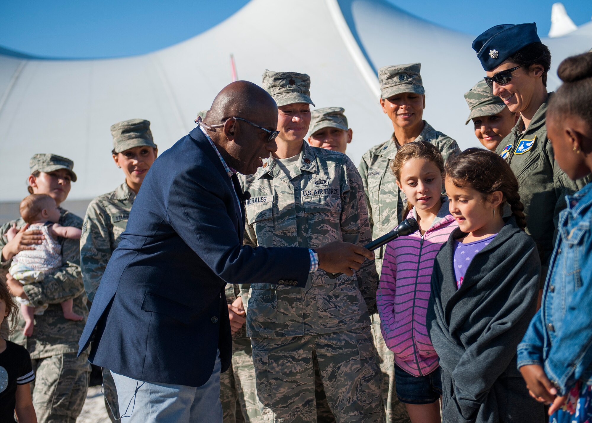 The Today Show’s Al Roker interacts with base children during a live TV Mother’s Day segment during the 96th Force Support Squadron’s Mission Breakfast May 4 at Eglin Air Force Base, Fla. (U.S. Air Force photo/Ilka Cole)