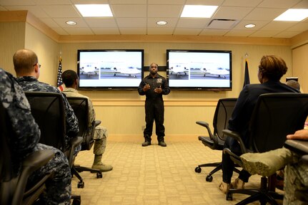 Pilot Barrington Irving discusses the importance of science, technology, engineering and math (STEM) with members of U.S. Strategic Command (USSTRATCOM) during his visit to Offutt Air Force Base, Neb., May 6, 2016. In his presentation, Irving shared stories behind many of his scientific achievements, which include becoming the youngest pilot to fly around the world in a single-engine airplane and conducting research expeditions on every continent except Antarctica. In 2003, Irving founded the Experience Aviation, a non-profit organization, and set up the Experience Aviation Learning Center to offer STEM-based programs and career guidance to middle school and high school students in the Miami area. One of nine DoD unified combatant commands, USSTRATCOM has global strategic missions, assigned through the Unified Command Plan, which include strategic deterrence; space operations; cyberspace operations; joint electronic warfare; global strike; missile defense; intelligence, surveillance and reconnaissance; combating weapons of mass destruction; and analysis and targeting. (USSTRATCOM photo by U.S. Air Force Staff Sgt. Jonathan Lovelady)