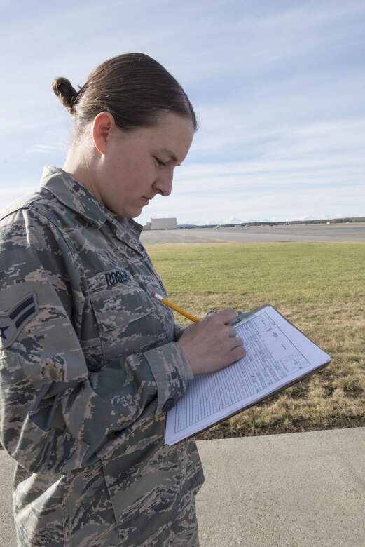 U.S. Air Force Airman 1st Class Lisa Rogers, a 354th Operations Support Squadron (OSS) weather forecaster apprentice, records sky conditions, May 4, 2016, at Eielson Air Force Base, Alaska. Members from the 354th OSS and 18th OSS from Kadena Air Base work together during RED FLAG-Alaska 16-1 to deliver current weather conditions to pilots. (U.S. Air Force photo by Staff Sgt. Ashley Nicole Taylor/Released)
