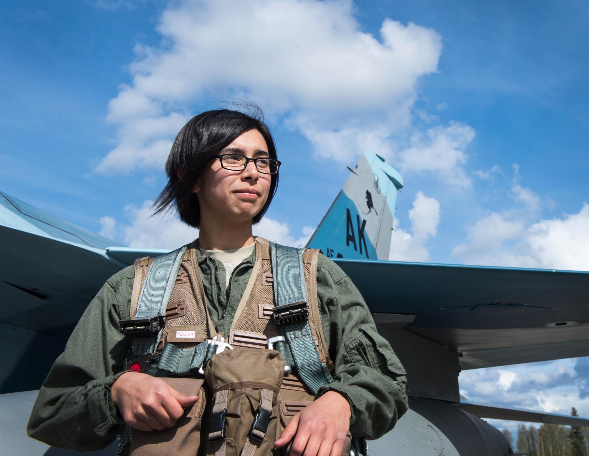 U.S. Air Force Airman 1st Class Victoria Ortaleza, a 354th Aircraft Maintenance Squadron electronic and environmental systems journeyman, waits to board the F-16D Fighting Falcon aircraft she will fly in at Eielson Air Force Base, Alaska, May 4, 2016, during a RED FLAG-Alaska 16-1 sortie. Ortaleza was recommended by her leadership for the flight to learn the impacts of her contribution to the flying mission. (U.S. Air Force photo by Staff Sgt. Shawn Nickel/Released) 