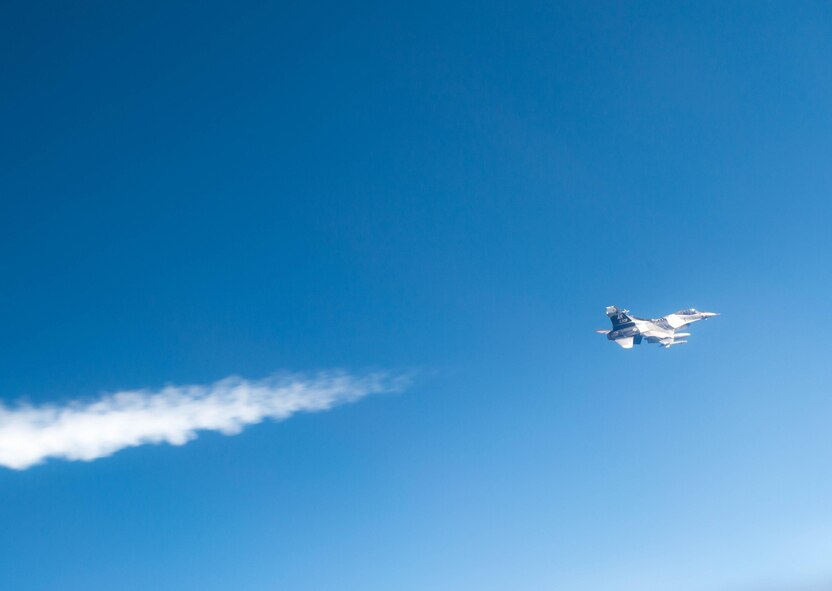 U.S. Air Force Maj. Jeromy Guinther, an 18th Aggressor Squadron pilot, flies an F-16 Fighting Falcon aircraft May 4, 2016, over the Joint Pacific Alaska Range Complex (JPARC), during RED FLAG-Alaska (RF-A) 16-1. Sorties for RF-A are flown in the JPARC, a more than 67,000 square mile area that provides a realistic training environment and allows commanders to train for full spectrum engagements, ranging from individual skills to complex, large-scale joint engagements. (U.S. Air Force photo by Staff Sgt. Shawn Nickel/Released)