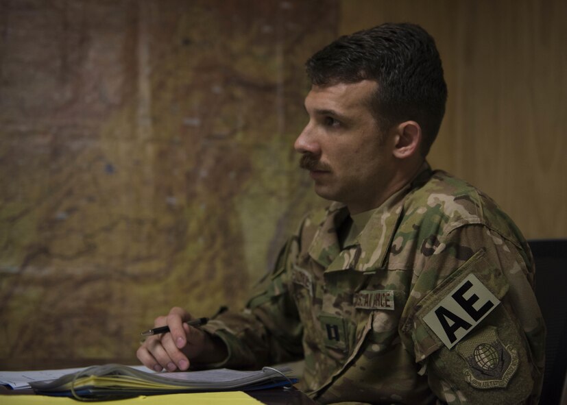 Capt. Robert Fiorillo, 455th Expeditionary Aeromedical Evacuation Squadron, listens in on the crew brief at Bagram Airfield, Afghanistan, May 05, 2016. The 455th EAES Airmen are on call and remain ready to transport patients at a moments notice. (U.S. Air Force photo by Senior Airman Justyn M. Freeman)