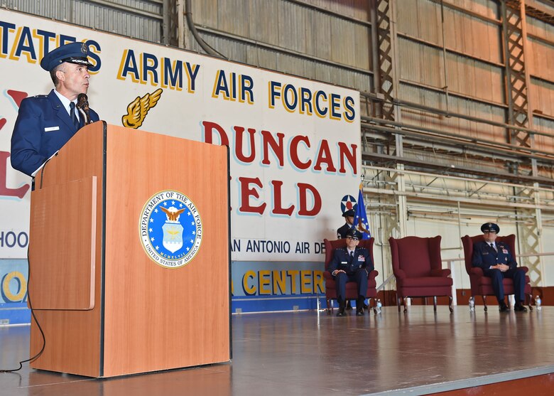 Brig. Gen. Robert I. Miller, incoming Air Force Medical Operations Agency commander, greets members of AFMOA and the San Antonio military medical community during a May 6 change of command ceremony at Port San Antonio. Lt. Gen. Mark A. Ediger, Surgeon General of the Air Force, officiated the ceremony, welcoming Miller to his new command. (U.S. Air Force photo / Tech. Sgt. Christopher Carwile)