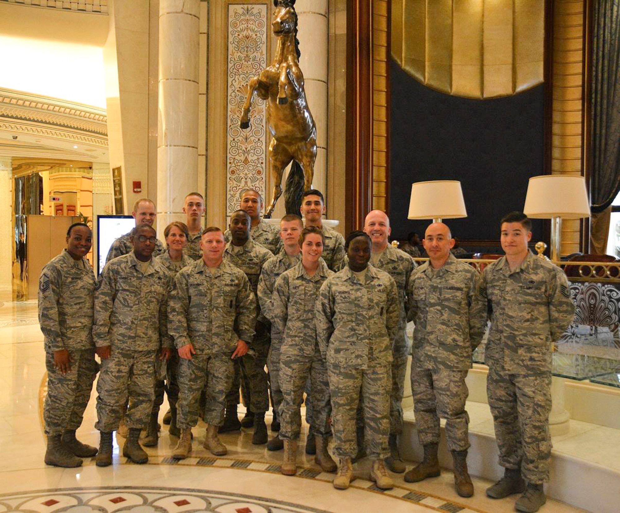 Airmen from the 879th Expeditionary Security Forces Squadron pose for a photo after meeting President Barack Obama during his visit to Riyadh, Saudi Arabia. Not only did the squadron support the presidential mission on short notice, but they also simultaneously supported other distinguished visitors, to include senior government and military officials. During the president's visit, a total of 15 879th ESFS Airmen were given the chance to meet him as he thanked them for their service. (Courtesy photo)