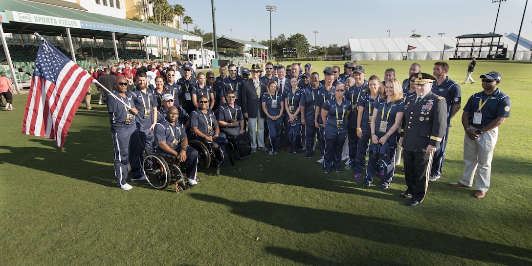 Army Chief of Staff Gen. Mark A. Milley, lower right, poses with athletes competing on the U.S. team at  Invictus Games 2016 in Orlando, Fla., May 8, 2016. DoD photo by Roger Wollenberg 
