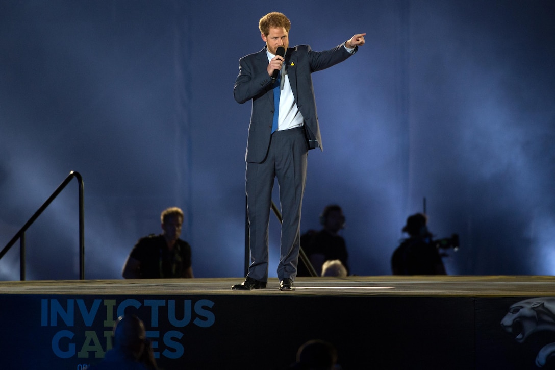 Prince Harry speaks to athletes and audience members during the opening ceremony of the Invictus Games 2016 in Orlando, Fla., May 8, 2016. DoD photo by EJ Hersom