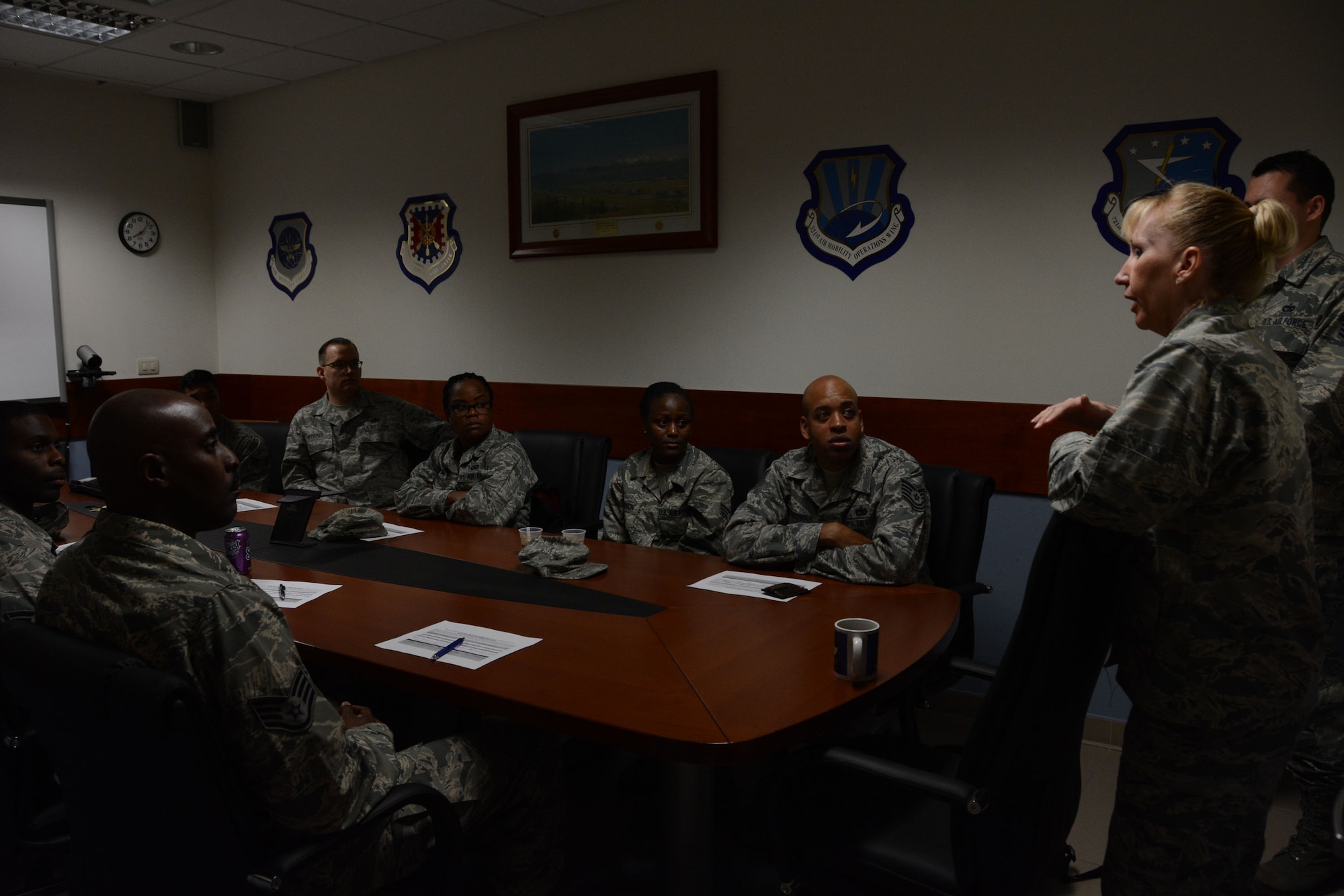 Maj. Michelle Charleston, 724th Air Mobility Squadron commander, greets reservists from the 71st Aerial Port Squadron as they begin their hands-on training at her organization's air terminal operations. The objective of the training was for the reservists to strengthen their profiency in multiple aspects of their career field. (U.S. Air Force photo Tech. Sgt. Mercedes Crossland) 