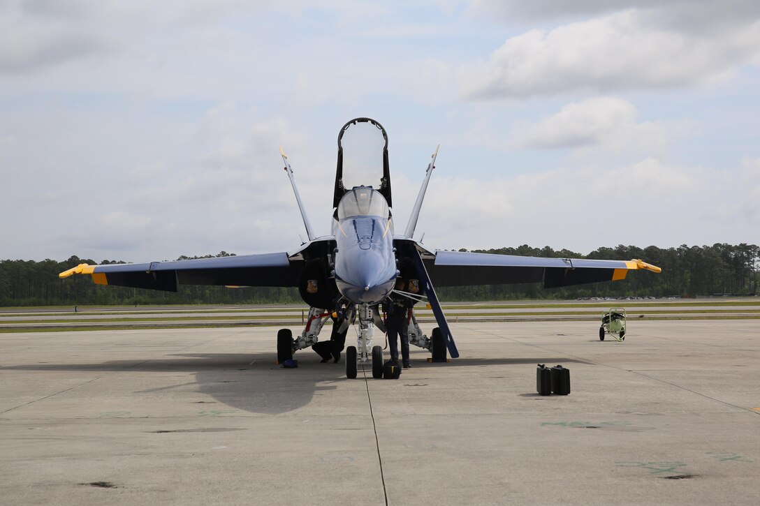 A U.S. Navy Blue Angels F/A-18 Hornet sits static on the flight line prior to the 2016 Marine Corps Air Station Cherry Point Air Show -- 
Celebrating 75 Years" at MCAS Cherry Point, N.C., April 28, 2016. The Blue Angels showcase the pride and professionalism of the Navy and the Marine Corps by inspiring a culture of excellence and service to country through flight demonstrations and community outreach. This year’s air show celebrated MCAS Cherry Point and 2nd Marine Aircraft Wing’s 75th anniversary and featured 40 static displays, 17 aerial performers, as well as a concert. (U.S. Marine Corps photo by Lance Cpl. Mackenzie Gibson/Released)