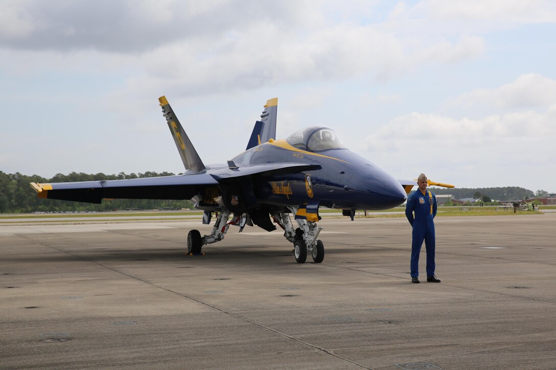 A U.S. Navy Blue Angels polot stands in front of his jet before the 2016 MCAS Cherry Point Air Show – “Celebrating 75 Years” at Marine Corps Air Station Cherry Point, N.C., April 28, 2016. The U.S. Navy Blue Angels showcase the pride and professionalism of the Navy and the Marine Corps by inspiring a culture of excellence and service to country through flight demonstrations and community outreach. This year’s air show celebrated MCAS Cherry Point and 2nd Marine Aircraft Wing’s 75th anniversary and featured 40 static displays, 17 aerial performers, as well as a concert. (U.S. Marine Corps photo by Lance Cpl. Mackenzie Gibson/Released)