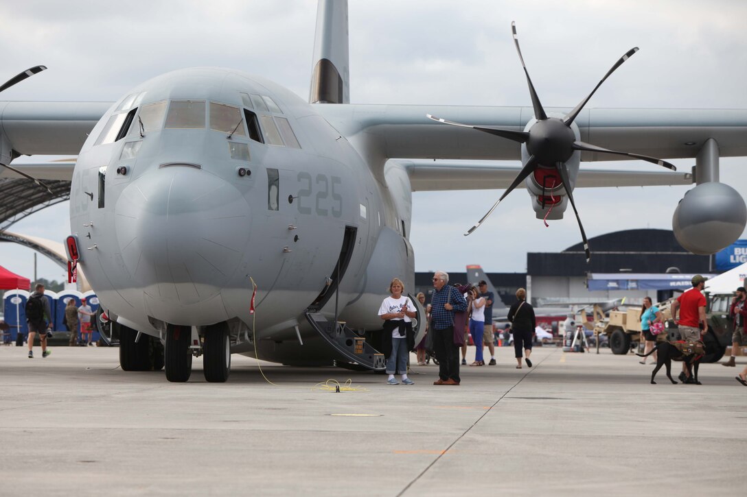 Marines, Sailors and civilian air show patrons tour the inside and outside of a C-130J Super Hercules during the 2016 MCAS Cherry Point Air Show --  "Celebrating 75 Years" at Marine Corps Air Station Cherry Point, N.C., April 29, 30 and May 1, 2016. This years air show celebrated the 75th anniversary of 2nd Marine Aircraft Wing and MCAS Cherry Point and featured 40 static displays and 17 aerial performers. 