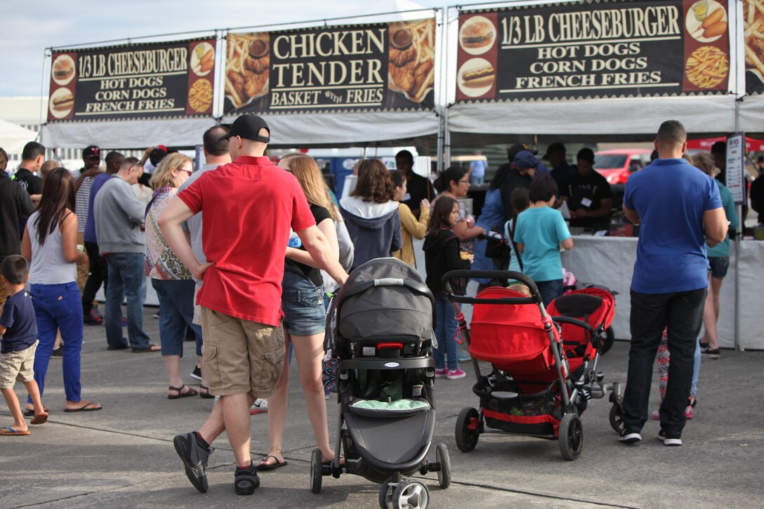 Vendors sell products and goods at tents and stands at the 2016 MCAS Cherry Point Air Show – “Celebrating 75 Years” at Marine Corps Air Station Cherry Point, N.C., April 29, 30 and May 1 2016. This year’s air show celebrated MCAS Cherry Point and 2nd Marine Aircraft Wing’s 75th anniversaries and featured 40 static displays, 17 aerial performers and a concert.