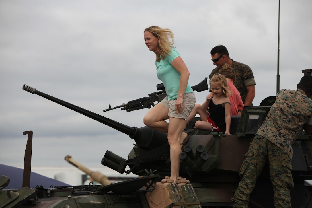 Marines, Sailors and civilian air show patrons view static displays of aircraft and weapons during the 2016 MCAS Cherry Point Air Show --  "Celebrating 75 Years" at Marine Corps Air Station Cherry Point, N.C., April 29, 30 and May 1, 2016. This years air show celebrated the 75th anniversary of 2nd Marine Aircraft Wing and MCAS Cherry Point and featured 40 static displays and 17 aerial performers. 