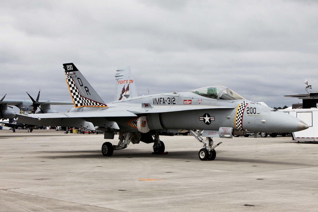 An F/A-18 Hornet with Marine Fighter Attack Squadron 312 sits static on the flight line during the 2016 MCAS Cherry Point Air Show --  "Celebrating 75 Years" at Marine Corps Air Station Cherry Point, N.C., April 29, 30 and May 1, 2016. This years air show celebrated the 75th anniversary of 2nd Marine Aircraft Wing and MCAS Cherry Point and featured 40 static displays and 17 aerial performers. 