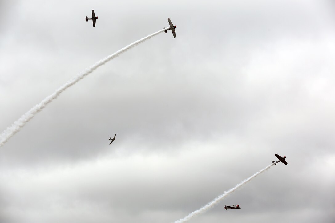 The Trojan Horsemen formation proves to be an unforgettable experience for patrons at the 2016 Marine Corps Air Station Cherry Point Air Show – “Celebrating 75 Years” at MCAS Cherry Point, N.C., April 29, 2016.
The Trojan Horsemen are a T-28 Warbird Formation Aerobatic Demo Team is the only six-ship T-28 Warbird formation demonstration team performing in the world today. This year’s air show celebrated MCAS Cherry Point and 2nd Marine Aircraft Wing’s 75th anniversary and is as much fun on the ground as it is in the air featuring 40 static displays, 17 aerial performers, as well as a concert. (U.S. Marine Corps photo by Lance Cpl. Mackenzie Gibson/ Released)
