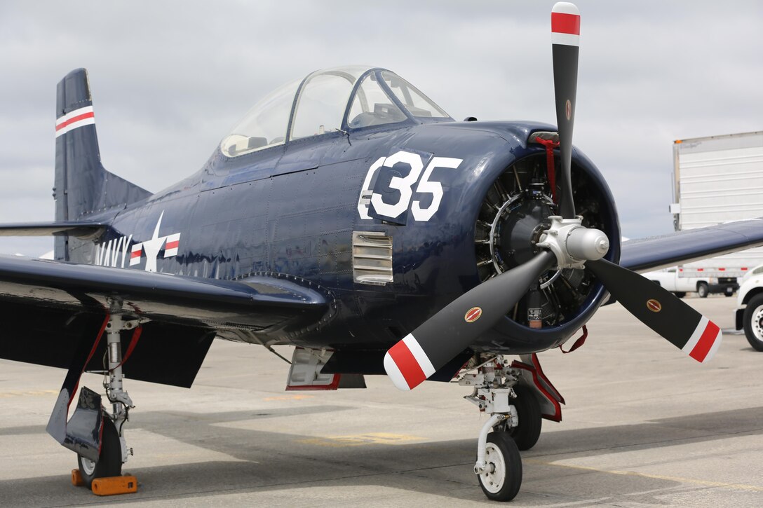 A T-28B Trojan sits on display at the 2016 MCAS Cherry Point Air Show – “Celebrating 75 Years” at Marine Corps Air Station Cherry Point, N.C., April 29, 2016. The Trojan Horsemen are a T-28 Warbird Formation Aerobatic Demo Team is the only six-ship T-28 Warbird formation demonstration team performing in the world today. This year’s air show celebrated MCAS Cherry Point and 2nd Marine Aircraft Wing’s 75th anniversary and is as much fun on the ground as it is in the air featuring 40 static displays, 17 aerial performers, as well as a concert. (U.S. Marine Corps photo by Lance Cpl. Mackenzie Gibson/ Released)