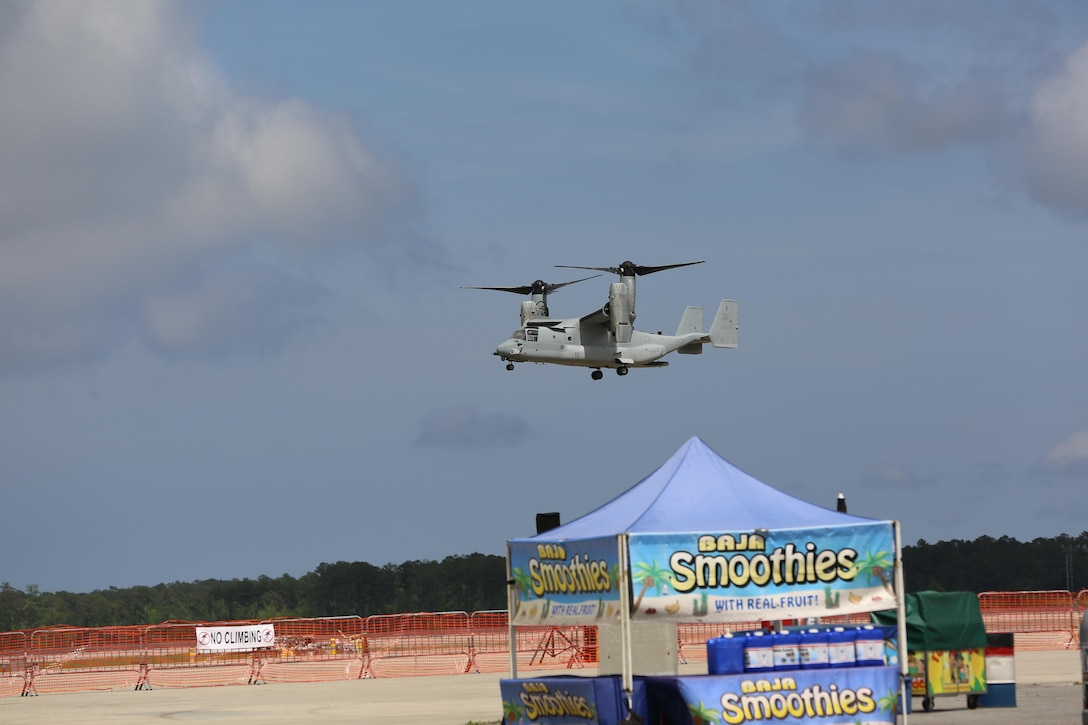 The Marine Air-Ground Task Force performs high speed demonstration on the flight line at the 2016 Marine Corps Air Station Cherry Point Air Show – “Celebrating 75 Years” at MCAS Cherry Point, N.C., May 1, 2016. The Marine Air-Ground Task Force is designed for swift deployment of Marine forces by air, land or sea. This year’s air show celebrated MCAS Cherry Point and 2nd Marine Aircraft Wing’s 75th anniversaries and featured 40 static displays, 17 aerial performers and a concert. (U.S. Marine Corps photo by Lance Cpl. Mackenzie Gibson/ Released)
