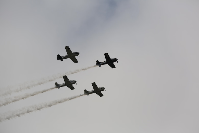 The Trojan Horsemen formation proves to be an unforgettable experience for patrons at the 2016 Marine Corps Air Station Cherry Point Air Show – “Celebrating 75 Years” at MCAS Cherry Point, N.C., April 29, 2016.
The Trojan Horsemen are a T-28 Warbird Formation Aerobatic Demo Team is the only six-ship T-28 Warbird formation demonstration team performing in the world today. This year’s air show celebrated MCAS Cherry Point and 2nd Marine Aircraft Wing’s 75th anniversary and is as much fun on the ground as it is in the air featuring 40 static displays, 17 aerial performers, as well as a concert. (U.S. Marine Corps photo by Lance Cpl. Mackenzie Gibson/ Released)
