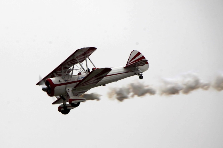 The PT-17 Stearman displays its great power while conducting a demonstration at the 2016 MCAS Cherry Point Air Show – “Celebrating 75 Years” at Marine Corps Air Station Cherry Point, N.C., April 30, 2016.
The PT-17 Stearman is powered by a nine-cylinder, 450 horsepower Pratt and Whitney Wasp engine, began as a basic flight trainer for the U.S. Army Air Corps in 1942. Since then, the aircraft was reconstructed to be faster and capable of inverted flight. This year’s air show celebrated MCAS Cherry Point and 2nd Marine Aircraft Wing’s 75th anniversaries and featured 40 static displays, 17 aerial performers and a concert.