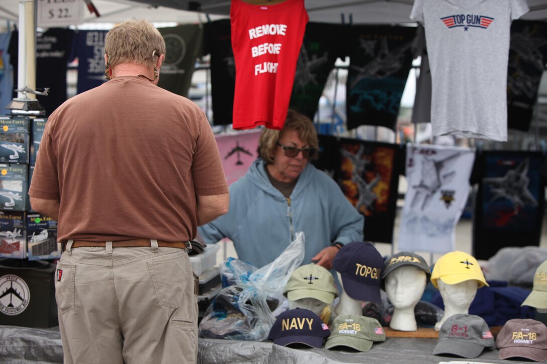 Vendors sell products and goods at tents and stands at the 2016 MCAS Cherry Point Air Show – “Celebrating 75 Years” at Marine Corps Air Station Cherry Point, N.C., April 29, 30 and May 1 2016. This year’s air show celebrated MCAS Cherry Point and 2nd Marine Aircraft Wing’s 75th anniversaries and featured 40 static displays, 17 aerial performers and a concert.