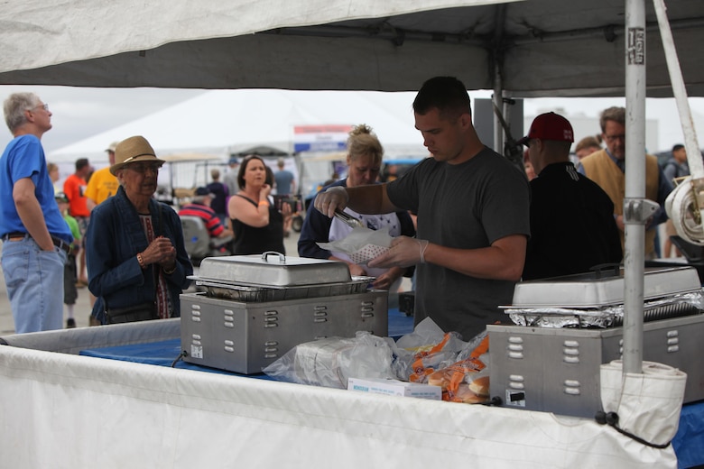 Vendors sell products and goods at tents and stands at the 2016 MCAS Cherry Point Air Show – “Celebrating 75 Years” at Marine Corps Air Station Cherry Point, N.C., April 29, 30 and May 1 2016. This year’s air show celebrated MCAS Cherry Point and 2nd Marine Aircraft Wing’s 75th anniversaries and featured 40 static displays, 17 aerial performers and a concert.