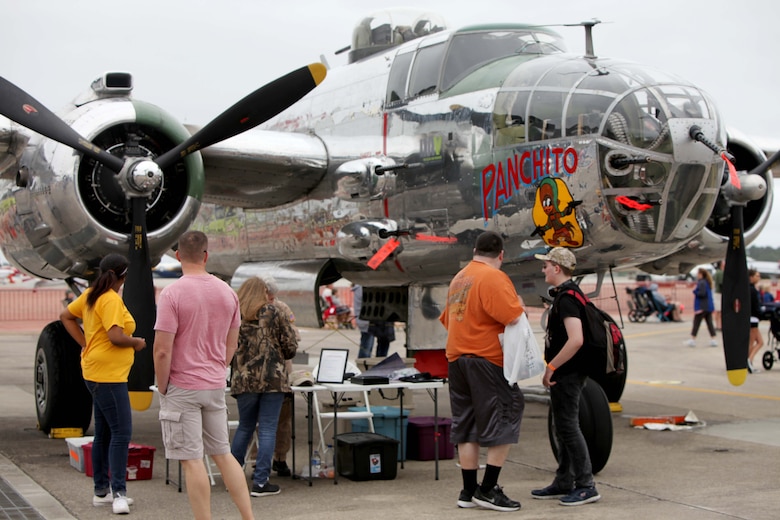 Marines, Sailors and civilian air show patrons view static displays of aircraft and weapons during the 2016 MCAS Cherry Point Air Show --  "Celebrating 75 Years" at Marine Corps Air Station Cherry Point, N.C., April 29, 30 and May 1, 2016. This years air show celebrated the 75th anniversary of 2nd Marine Aircraft Wing and MCAS Cherry Point and featured 40 static displays and 17 aerial performers. 