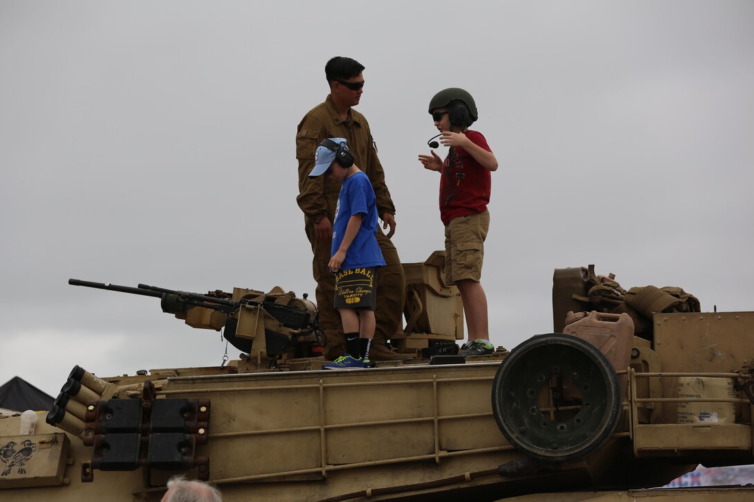 Children play among the many static displays at the 2016 Marine Corps Air Station Cherry Point Air Show – “Celebrating 75 Years” at MCAS Cherry Point, N.C., April 29, 2016. This year’s air show celebrated MCAS Cherry Point and 2nd Marine Aircraft Wing’s 75th anniversaries and featured 40 static displays, 17 aerial performers and a concert. (U.S. Marine Corps photo by Lance Cpl. Mackenzie Gibson/ Released)