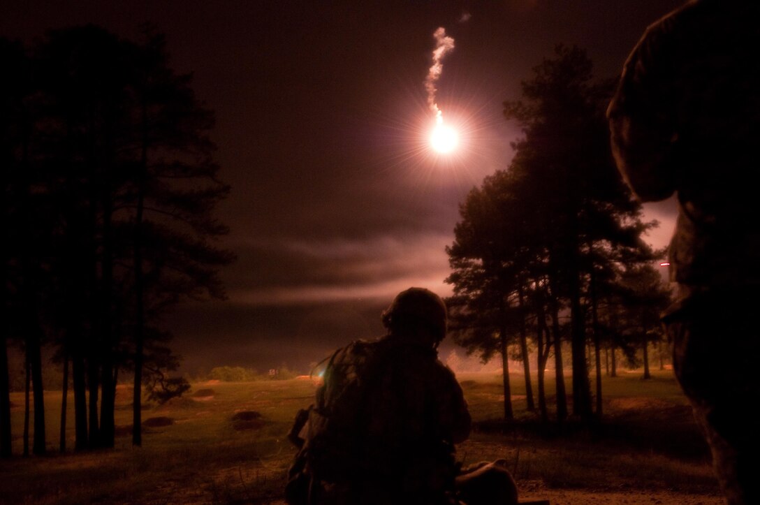 Spc. Michael Orozco of the 416th Engineering Command (Theater) engages targets during night range qualification at the 2016 U.S. Army Reserve Best Warrior Competition at Fort Bragg, N.C. May 5. This year’s Best Warrior Competition will determine the top noncommissioned officer and junior enlisted Soldier who will represent the U.S. Army Reserve in the Department of the Army Best Warrior Competition later this year at Fort A.P. Hill, Va. (U.S. Army photo by Sgt. George Thurmond II) (Released)