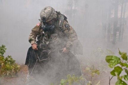 Spc. Kayla Bundy, representing 108th Training Command (IET), competes in the NBC evaluation lane at the 2016 U.S. Army Reserve Best Warrior Competition at Fort Bragg, N.C., May 5. This year’s Best Warrior Competition will determine the top noncommissioned officer and junior enlisted Soldier who will represent the U.S. Army Reserve in the Department of the Army Best Warrior Competition later this year at Fort A.P. Hill, Va. (U.S. Army photo by Sgt. Darryl L. Montgomery) (Released)