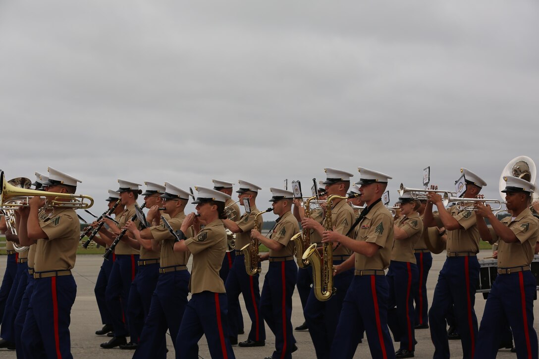 The Second Marine Aircraft Wing Band performs for spactators at the 2016 Marine Corps Air Station Cherry Point Air Show – “Celebrating 75 Years” at MCAS Cherry Point, N.C., April 30, 2016. The Second Marine Aircraft Wing Band continues this fine tradition by representing one of the finest organizations in musical excellence. This ensemble of Marine musicians completes over 150 commitments annually and travels in excess of 30,000 miles. Throughout their travels, they uphold the old and honored Marine traditions of pride, professionalism, and esprit de corps. (U.S. Marine Corps photo by Lance Cpl. Mackenzie Gibson/ Released)