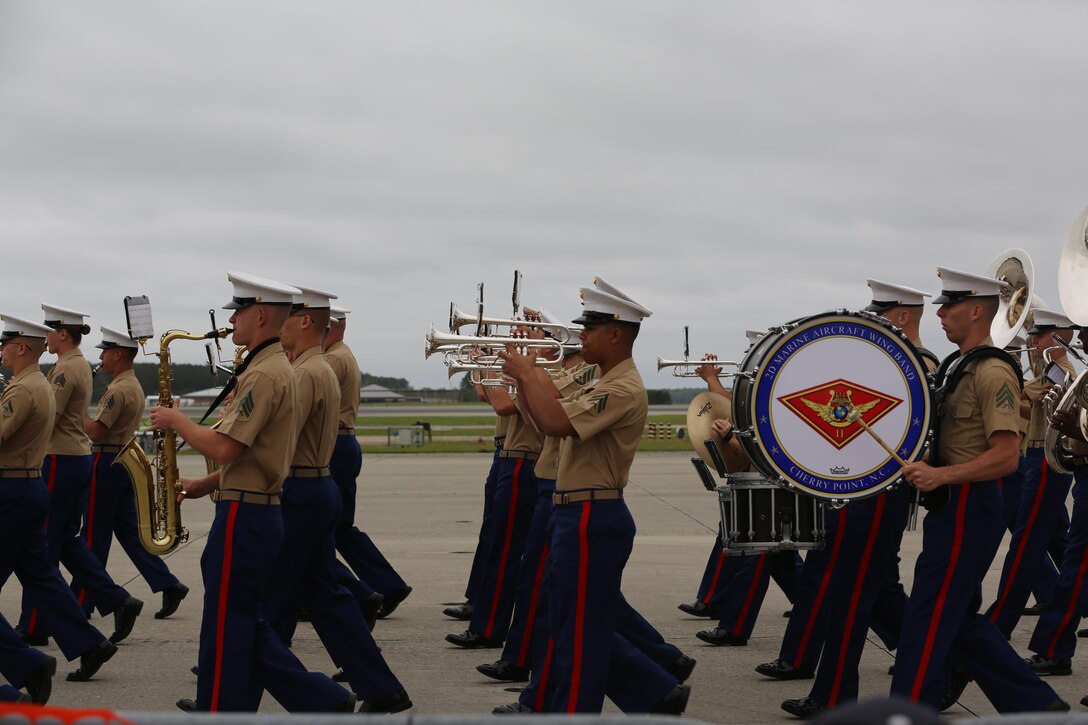 The Second Marine Aircraft Wing Band performs for spactators at the2016 Marine Corps Air Station Cherry Point Air Show – “Celebrating 75 Years” at MCAS Cherry Point, N.C., April 30, 2016. The Second Marine Aircraft Wing Band continues this fine tradition by representing one of the finest organizations in musical excellence. This ensemble of Marine musicians completes over 150 commitments annually and travels in excess of 30,000 miles. Throughout their travels, they uphold the old and honored Marine traditions of pride, professionalism, and esprit de corps. (U.S. Marine Corps photo by Lance Cpl. Mackenzie Gibson/ Released)