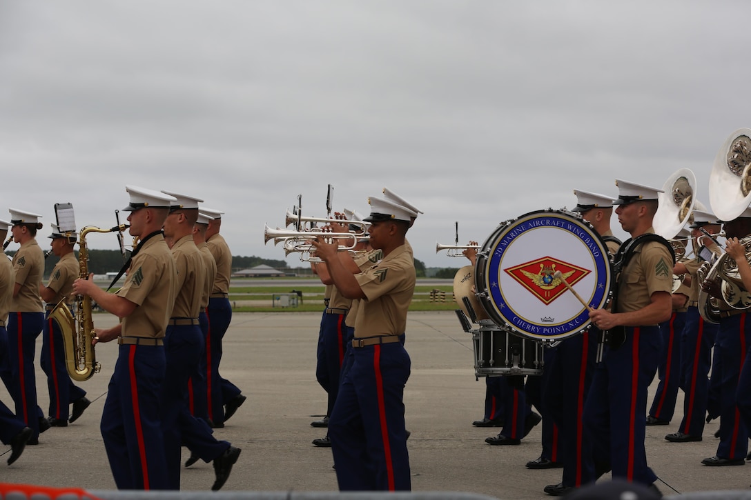 The Second Marine Aircraft Wing Band performs for spactators at the2016 Marine Corps Air Station Cherry Point Air Show – “Celebrating 75 Years” at MCAS Cherry Point, N.C., April 30, 2016. The Second Marine Aircraft Wing Band continues this fine tradition by representing one of the finest organizations in musical excellence. This ensemble of Marine musicians completes over 150 commitments annually and travels in excess of 30,000 miles. Throughout their travels, they uphold the old and honored Marine traditions of pride, professionalism, and esprit de corps. (U.S. Marine Corps photo by Lance Cpl. Mackenzie Gibson/ Released)