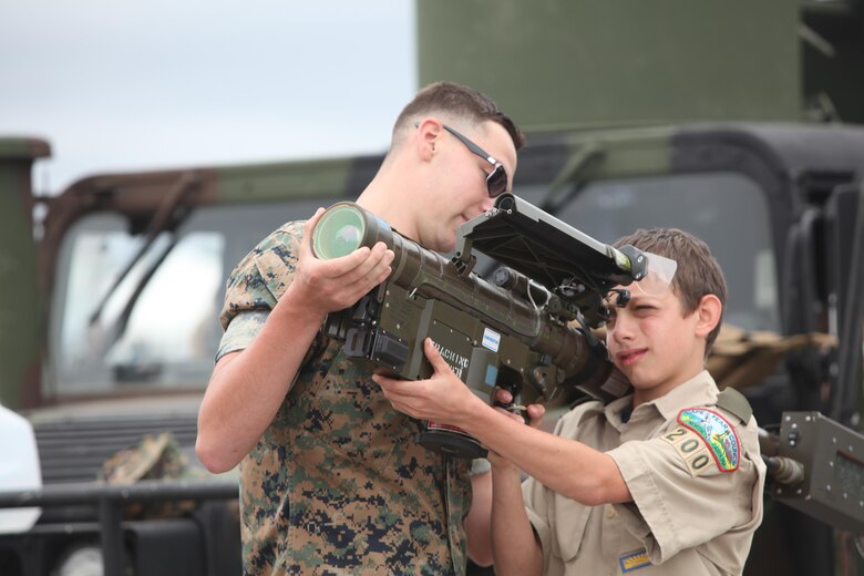 Marines, Sailors and civilian air show patrons view static displays of aircraft and weapons during the 2016 MCAS Cherry Point Air Show --  "Celebrating 75 Years" at Marine Corps Air Station Cherry Point, N.C., April 29, 30 and May 1, 2016. This years air show celebrated the 75th anniversary of 2nd Marine Aircraft Wing and MCAS Cherry Point and featured 40 static displays and 17 aerial performers.