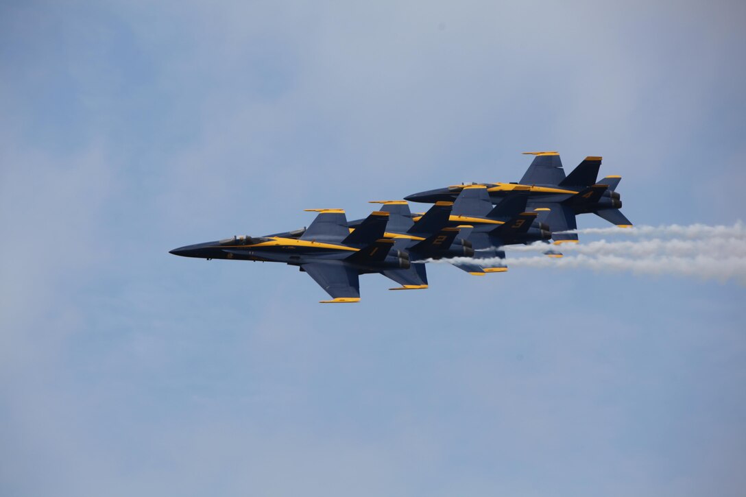 The U.S. Navy Blue Angels fly through the sky over the 2016 Marine Corps Air Station Cherry Point Air Show -- "Celebrating 75 Years" at MCAS Cherry Point, N.C., April 30, 2016. Blue Angels showcase the pride and professionalism of the Navy and the Marine Corps by inspiring a culture of excellence and service to country through flight demonstrations and community outreach. This year’s air show celebrated MCAS Cherry Point and 2nd Marine Aircraft Wing’s 75th anniversary and featured 40 static displays, 17 aerial performers, as well as a concert. 