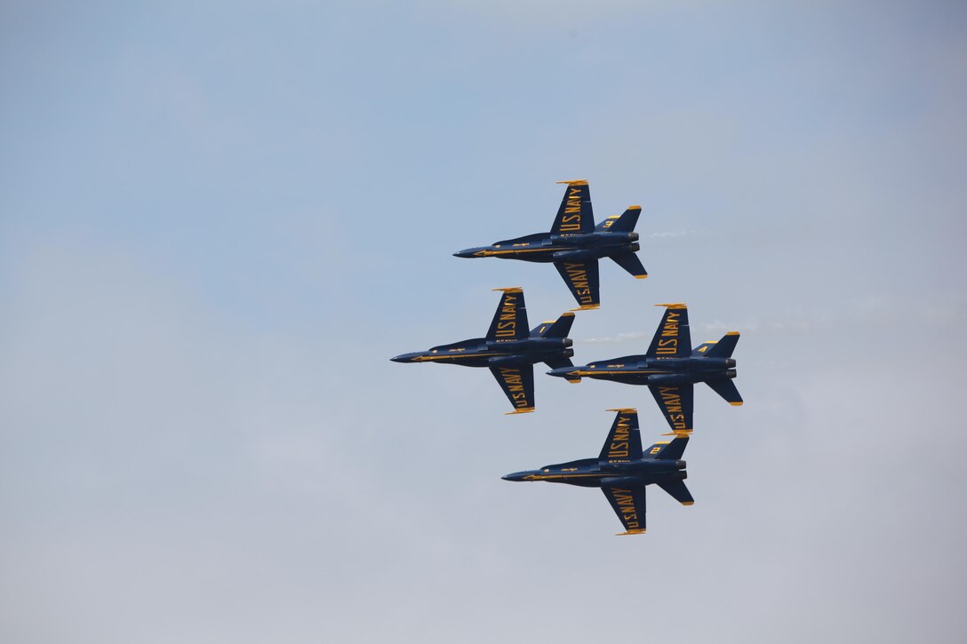 The U.S. Navy Blue Angels fly through the sky over the flight line at the 2016 Marine Corps Air Station Cherry Point Air Show -- "Celebrating 75 Years" at MCAS Cherry Point, N.C., April 30, 2016. Blue Angels showcase the pride and professionalism of the Navy and the Marine Corps by inspiring a culture of excellence and service to country through flight demonstrations and community outreach. This year’s air show celebrated MCAS Cherry Point and 2nd Marine Aircraft Wing’s 75th anniversary and featured 40 static displays, 17 aerial performers, as well as a concert. 