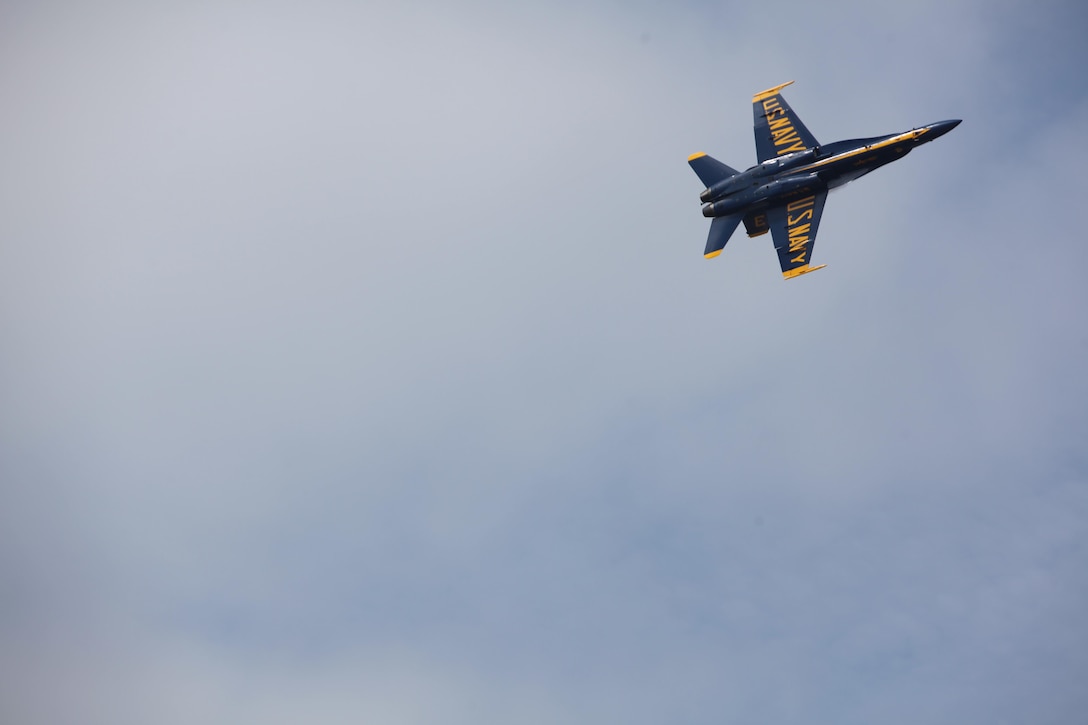 The U.S. Navy Blue Angels fly through the sky at the 2016 Marine Corps Air Station Cherry Point Air Show -- "Celebrating 75 Years" at MCAS Cherry Point, N.C., April 30, 2016. Blue Angels showcase the pride and professionalism of the Navy and the Marine Corps by inspiring a culture of excellence and service to country through flight demonstrations and community outreach. This year’s air show celebrated MCAS Cherry Point and 2nd Marine Aircraft Wing’s 75th anniversary and featured 40 static displays, 17 aerial performers, as well as a concert. 