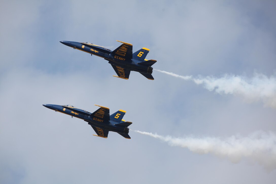 The U.S. Navy Blue Angels fly through the sky at the 2016 Marine Corps Air Station Cherry Point Air Show -- "Celebrating 75 Years" at MCAS Cherry Point, N.C., April 30, 2016. Blue Angels showcase the pride and professionalism of the Navy and the Marine Corps by inspiring a culture of excellence and service to country through flight demonstrations and community outreach. This year’s air show celebrated MCAS Cherry Point and 2nd Marine Aircraft Wing’s 75th anniversary and featured 40 static displays, 17 aerial performers, as well as a concert. 