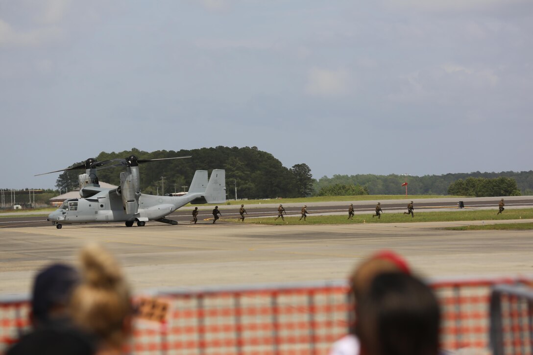 The Marine Air-Ground Task Force performs high speed demonstration on the flight line at the 2016 Marine Corps Air Station Cherry Point Air Show – “Celebrating 75 Years” at MCAS Cherry Point, N.C., May 1, 2016. The Marine Air-Ground Task Force is designed for swift deployment of Marine forces by air, land or sea. This year’s air show celebrated MCAS Cherry Point and 2nd Marine Aircraft Wing’s 75th anniversaries and featured 40 static displays, 17 aerial performers and a concert. (U.S. Marine Corps photo by Lance Cpl. Mackenzie Gibson/ Released)
