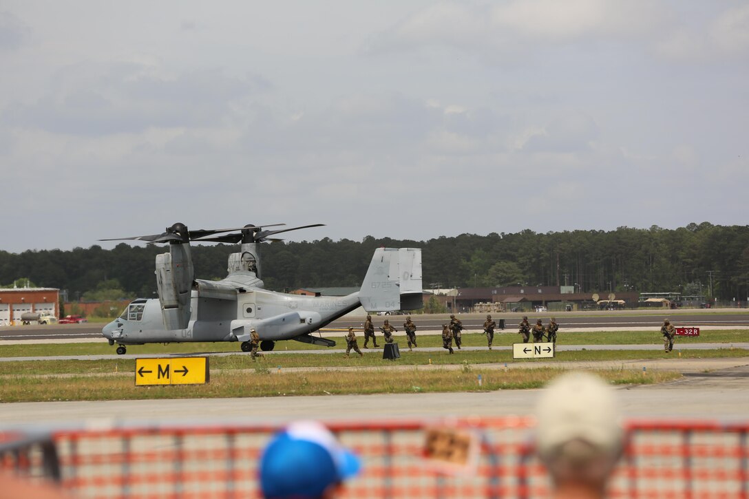 The Marine Air-Ground Task Force performs high speed demonstration on the flight line at the 2016 Marine Corps Air Station Cherry Point Air Show – “Celebrating 75 Years” at MCAS Cherry Point, N.C., May 1, 2016. The Marine Air-Ground Task Force is designed for swift deployment of Marine forces by air, land or sea. This year’s air show celebrated MCAS Cherry Point and 2nd Marine Aircraft Wing’s 75th anniversaries and featured 40 static displays, 17 aerial performers and a concert. (U.S. Marine Corps photo by Lance Cpl. Mackenzie Gibson/ Released)
