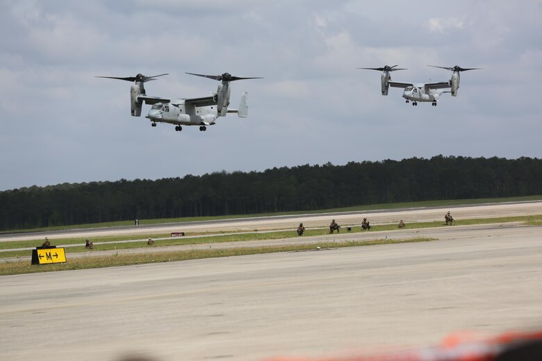 The Marine Air-Ground Task Force performs high speed demonstration on the flight line at the 2016 Marine Corps Air Station Cherry Point Air Show – “Celebrating 75 Years” at MCAS Cherry Point, N.C., May 1, 2016. The Marine Air-Ground Task Force is designed for swift deployment of Marine forces by air, land or sea. This year’s air show celebrated MCAS Cherry Point and 2nd Marine Aircraft Wing’s 75th anniversaries and featured 40 static displays, 17 aerial performers and a concert. (U.S. Marine Corps photo by Lance Cpl. Mackenzie Gibson/ Released)
