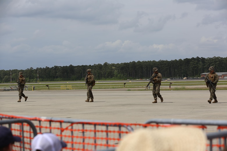 The Marine Air-Ground Task Force performs high speed demonstration on the flight line at the 2016 Marine Corps Air Station Cherry Point Air Show – “Celebrating 75 Years” at MCAS Cherry Point, N.C., May 1, 2016. The Marine Air-Ground Task Force is designed for swift deployment of Marine forces by air, land or sea. This year’s air show celebrated MCAS Cherry Point and 2nd Marine Aircraft Wing’s 75th anniversaries and featured 40 static displays, 17 aerial performers and a concert. (U.S. Marine Corps photo by Lance Cpl. Mackenzie Gibson/ Released)
